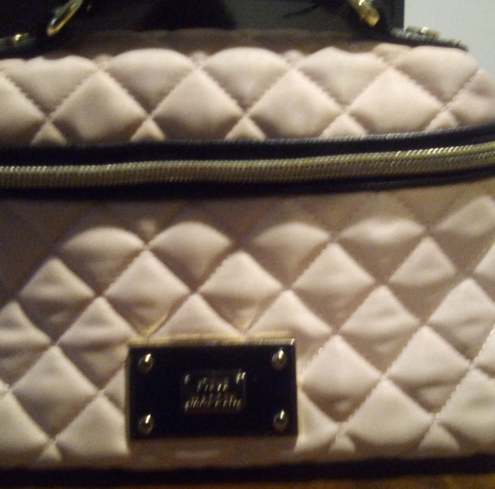 Steve Madden pink quilted makeup bag